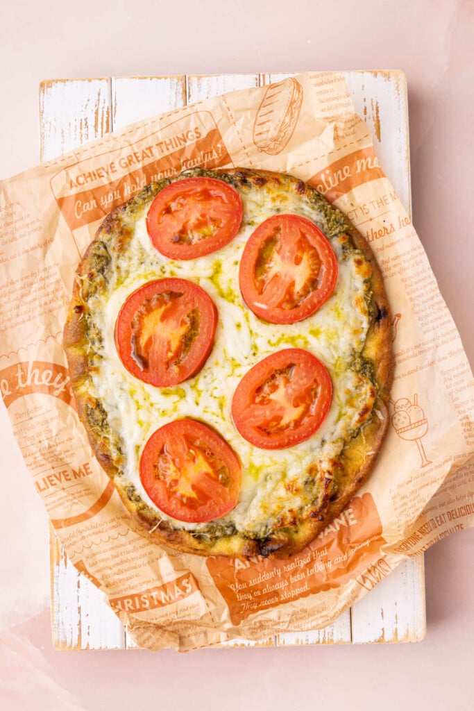 Naan pizza with pesto fresh out of the oven.