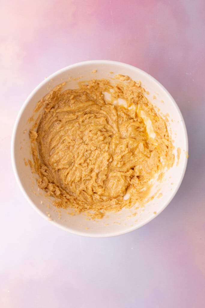 Butter, brown sugar, vanilla extract, and an egg beat together.