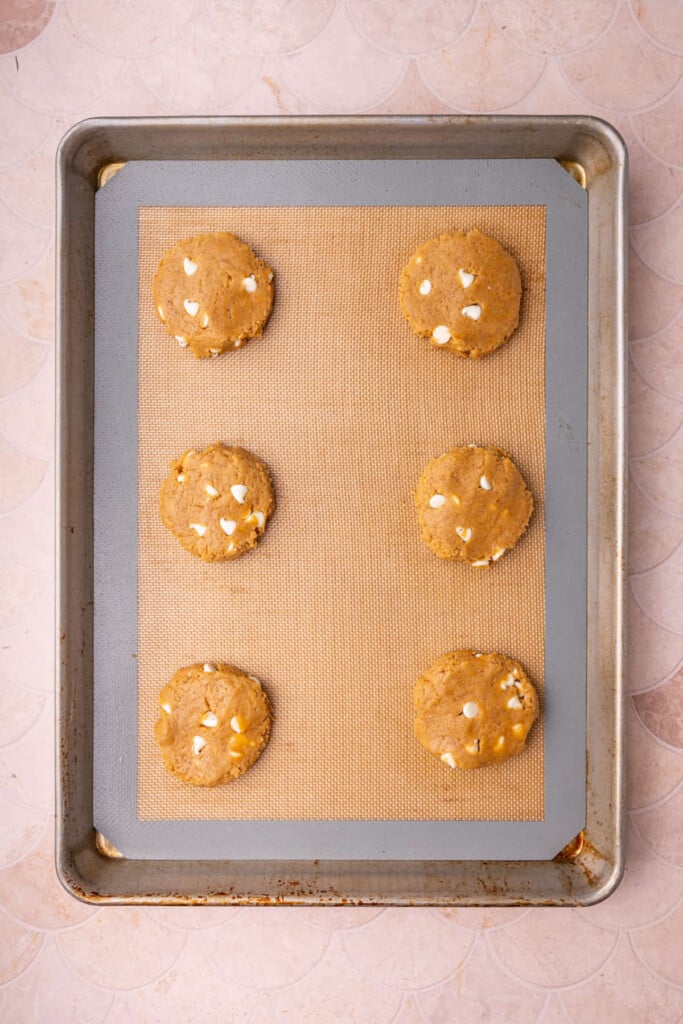 Flattened cookie dough shaped before baking because they do not spread in the oven.