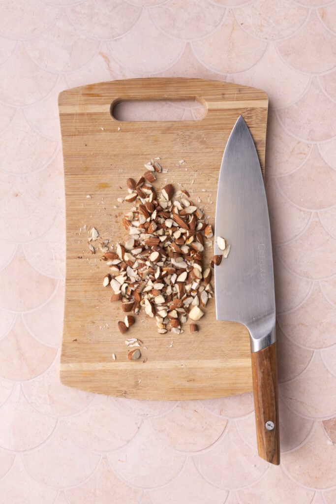 Almonds roughly chopped into various sizes.