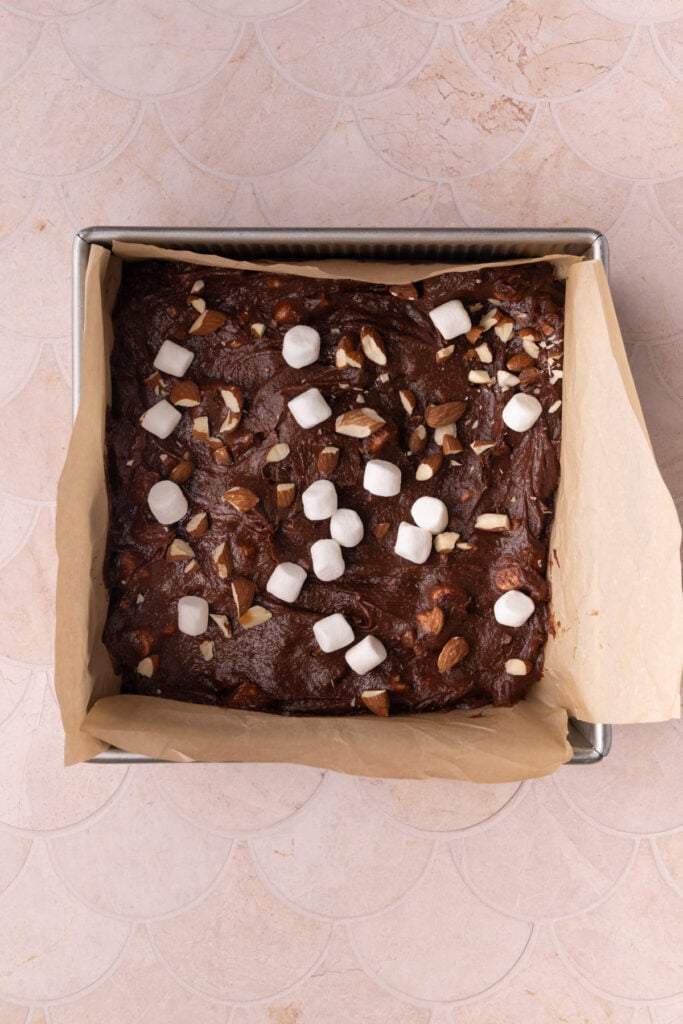 Rocky road brownies ready to be baked in the oven.