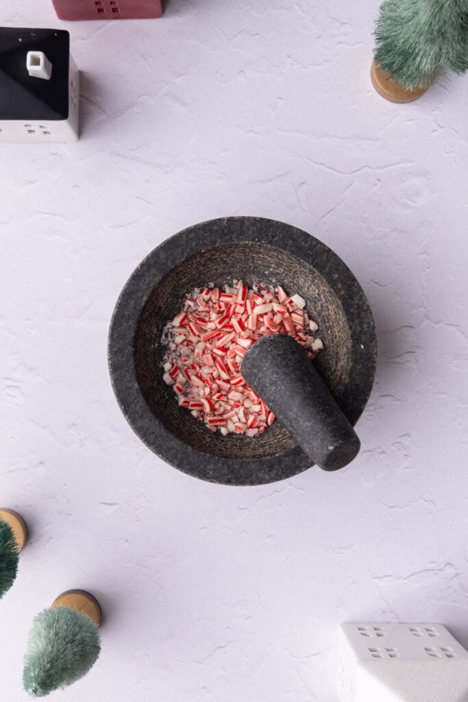 Candy cane crushed with a pestle and mortar.