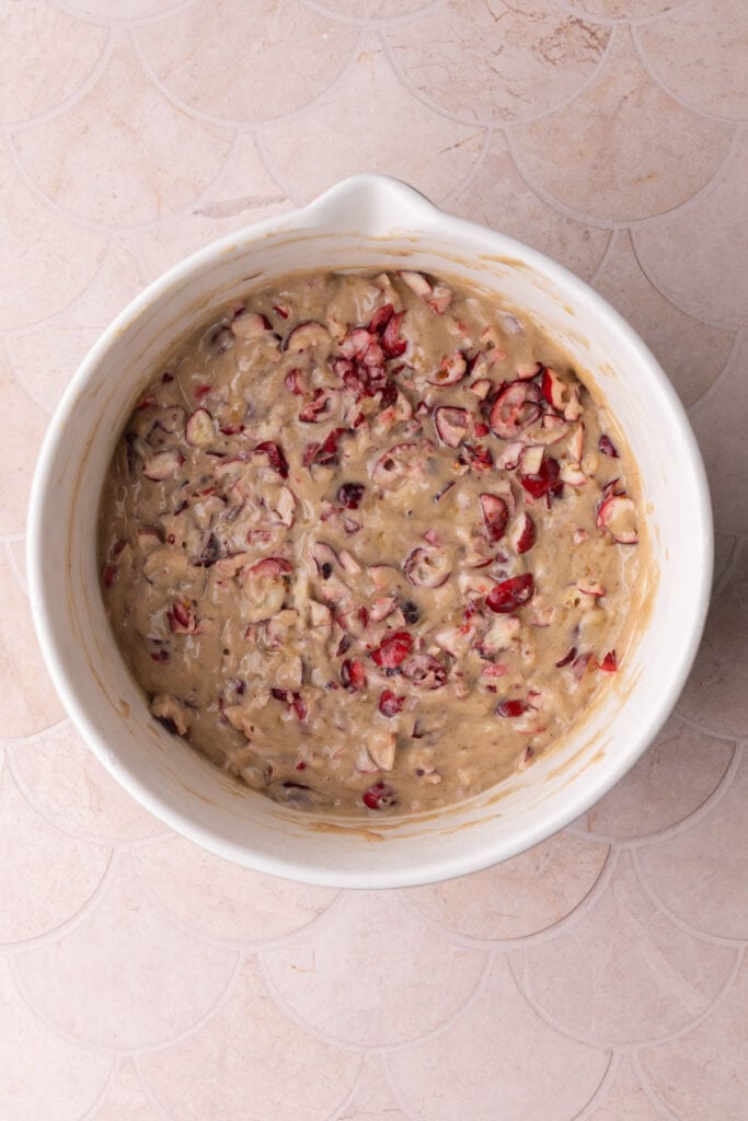 Diced fresh cranberries folded into banana bread batter.