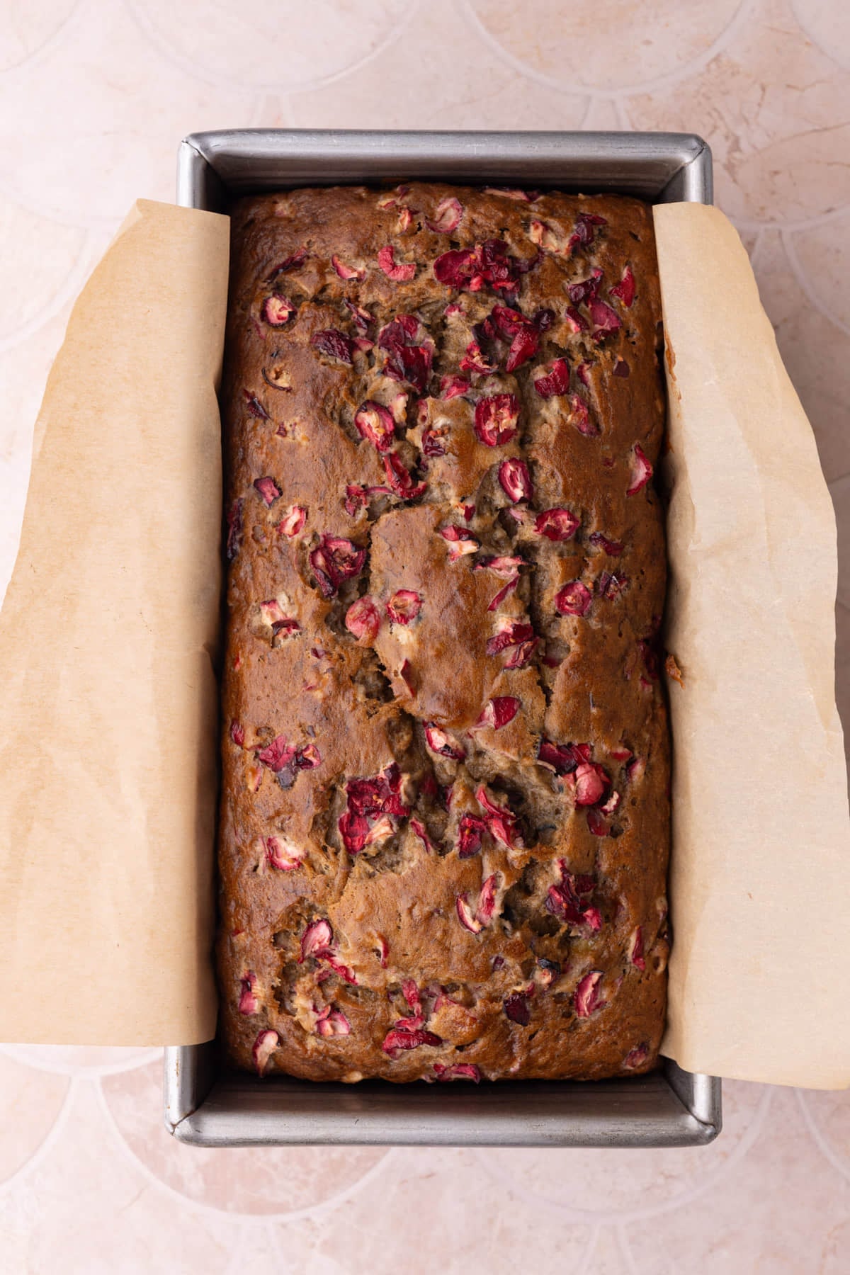 Banana bread with cranberries fresh out of the oven.