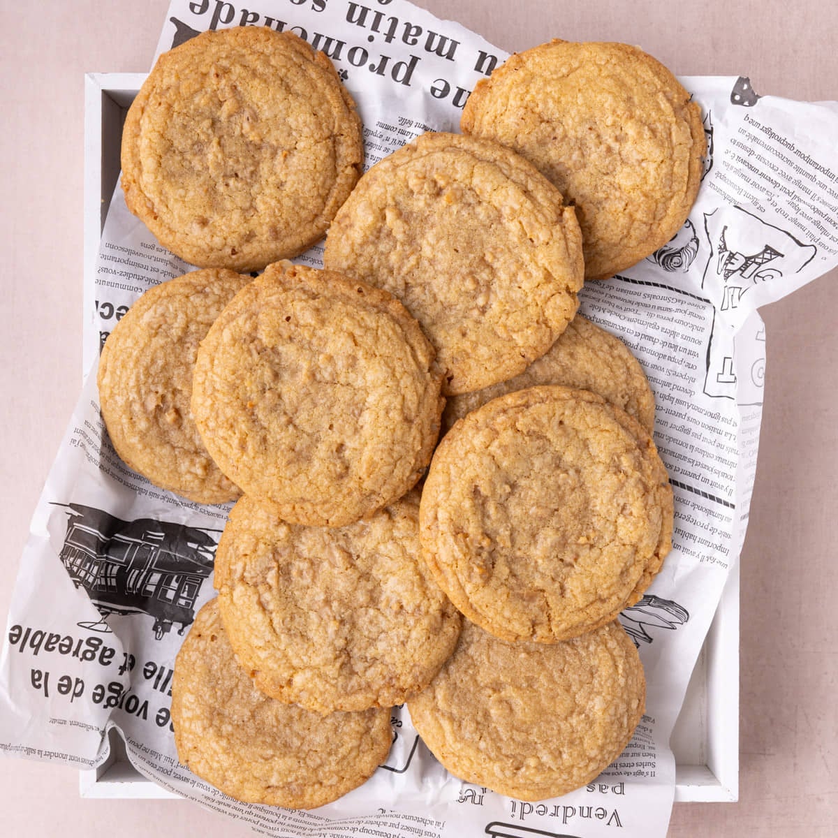 Butter Crunch Cookies Featured Image Overhead image of chewy butter crunch cookies made with brown butter and toffee bits.