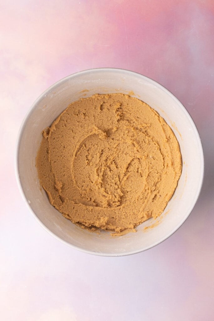 Cookie dough made with Biscoff cookie butter ready to shape into cookies.