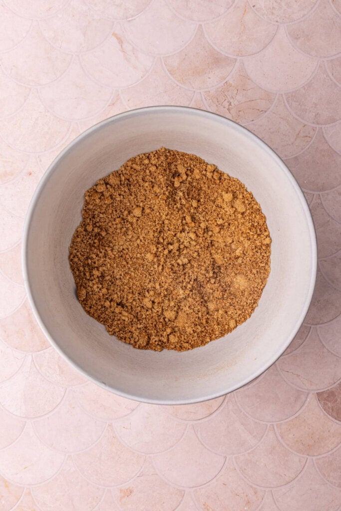 Cinnamon and sugar mixture in a bowl ready to add to coffee cake to give it it's iconic flavor.