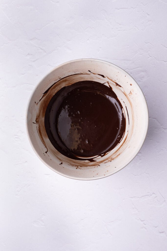 Chocolate glaze made from powdered sugar, cocoa powder, and milk whisked together with a hand mixer.