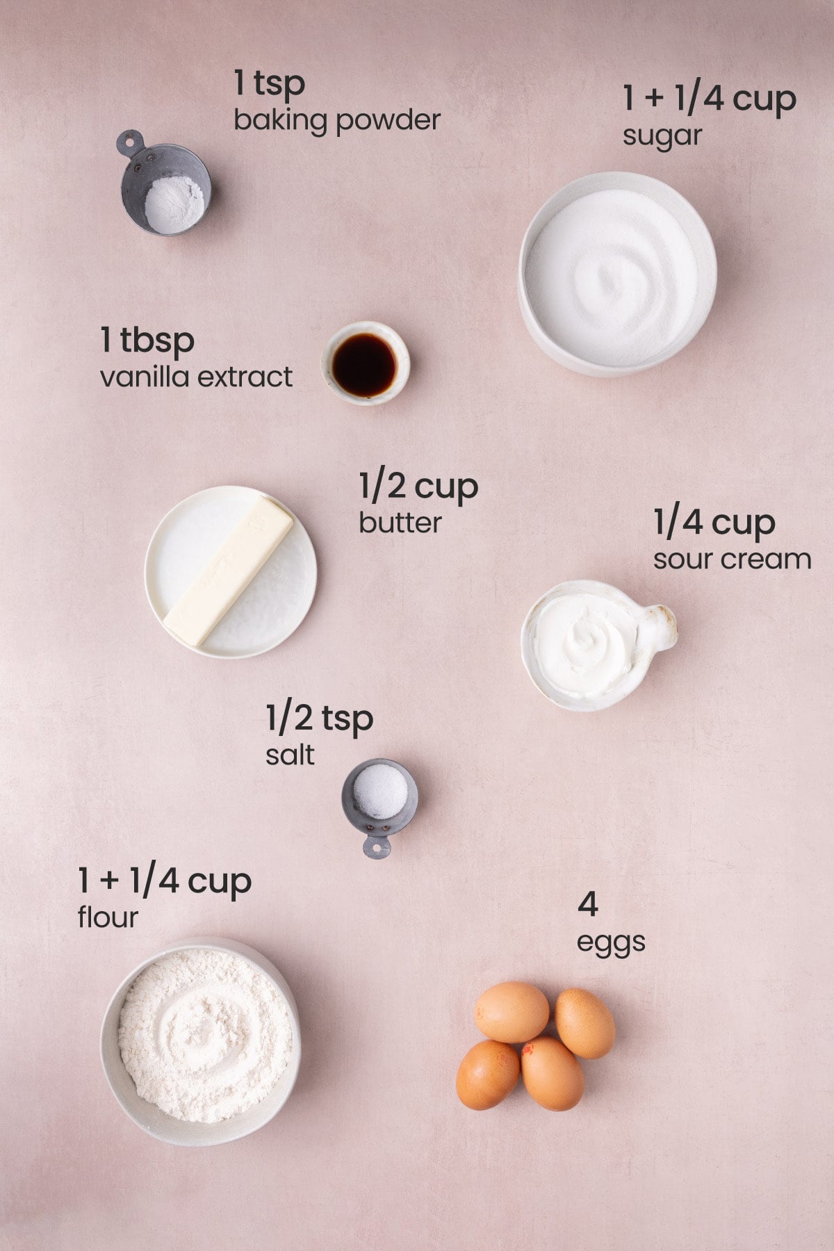 Everything you need to make sour cream pound cake including butter, sugar, vanilla extract, eggs, sour cream, flour, salt, and baking powder.