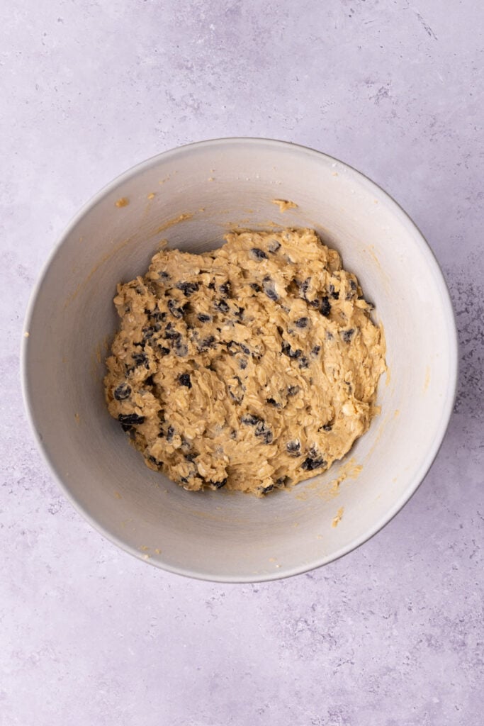 Oatmeal raisin cookie dough ready to transfer to a baking dish.