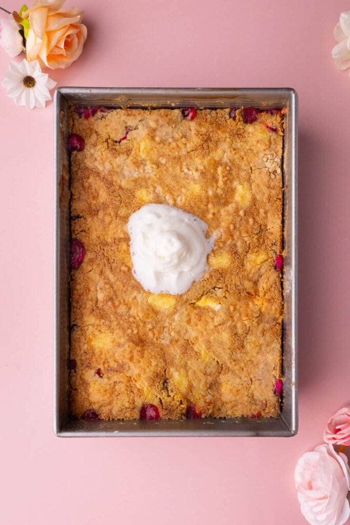 Strawberry Cheesecake Dump Cake fresh out of the oven cooling in the dish.