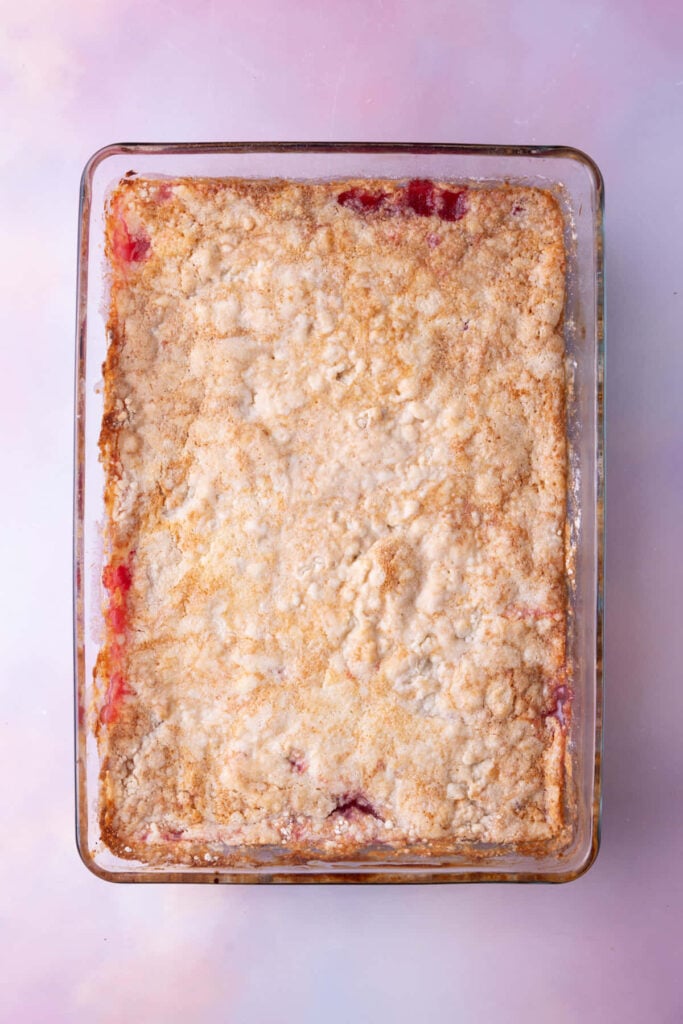 Pineapple Cherry Dump Cake fresh out of the oven, still bubbling in the dish.
