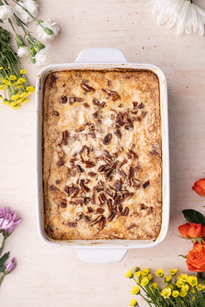 Pumpkin dump ckae with pecans fresh out of the oven still cooling and setting in the baking dish.