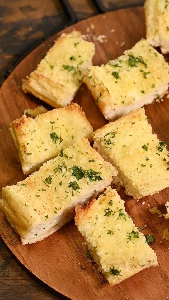 This Garlic Bread Spread only requires 4 ingredients and comes together quickly to make the best homemade garlic bread!

Ingredients
🧄 ¾ cup unsalted butter, softened 
🧄 ½ teaspoon garlic salt
🧄 4 cloves garlic
🧄 ¼ cup fresh parsley, tightly packed (leaves and stems)

Method
Garlic Bread Spread
🧄Prep ingredients by peeling garlic, chopping parsley, and making sure your butter is softened.  🧄 Add the peeled garlic to the food processor or high-powered blender and blend on high until minced. Alternatively, you can use a sharp knife to mince your garlic and add it to a large mixing bowl.  🧄 Add the garlic salt and softened butter to the food processor and blend until smooth and well-combined. If you’re not using a food processor, add the garlic salt and softened butter to the bowl with the minced garlic and use a hand mixer to combine.  🧄 Remove the blade from the food processor or blender and add the chopped parsley (if not using food processor, add parsley to the bowl with the garlic butter). 🧄 Use a wooden spoon or spatula to mix the parsley into the spread.  🧄 Store the garlic butter spread in the refrigerator for up to 15 days until ready to use.

Using Your Garlic Bread Spread
🧄 Preheat the oven to 350°F. 🧄 Select your bread of choice and add to a baking sheet. My preference is an Italian baguette. If using a baguette, slice in half lengthwise and generously spread the homemade garlic butter on the bread. 🧄 Bake for 8-12 minutes until the edges of the bread start to turn golden brown. If necessary, slice into individual portions and enjoy!
#garlicbread #homemadegarlicbread #garlicbutter #4ingredients #easyappetizers #garliclovers