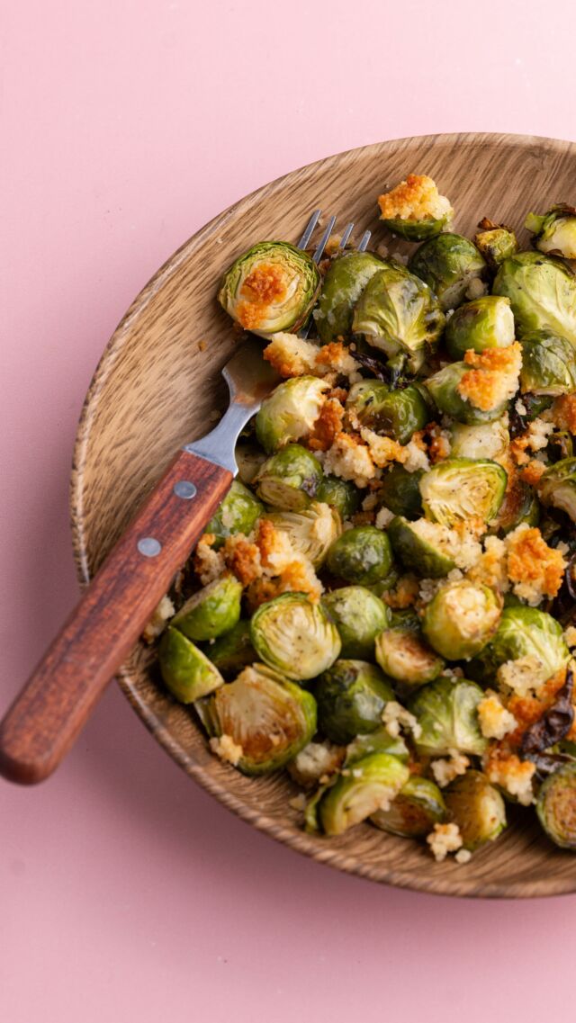 These Parmesan Crusted Brussels Sprouts consist of tender, roasted Brussels sprouts with a crispy, golden Parmesan crust.

Ingredients
-1 pound brussels sprouts
-2 tablespoons olive oil
-½ teaspoon salt
-½ teaspoon black pepper
-3 tablespoons salted butter
-¼ cup Parmesan cheese
-¼ cup Panko breadcrumbs

 Method
-Preheat your oven to 425°F. -Prep your brussels sprouts by trimming the ends off and slicing them in half lengthwise. -Add your prepared brussels sprouts to a large baking sheet. Add the olive oil, salt, and pepper, and toss to coat. Roast on the top rack of the oven for 15 minutes. -Meanwhile, add the butter to a microwave-safe bowl and melt it in the microwave on high. Start with 30 seconds, then stir. If it’s not melted after 30 seconds, continue to heat in 20-second intervals until its liquefied.  -Add the Parmesan and Panko to the melted butter and mix with a fork to form your Parm Crust.  -After 15 minutes, remove the brussels sprouts from the oven and use a spatula to push all of them to the center of the pan, so they are all touching, but still in a single layer. -Use clean hands to crumble the Parmesan-Panko-butter mixture on top of the brussels sprouts.  -Roast again on the top rack for 10 more minutes until the brussels sprouts are tender and the Parmesan crust is crispy and golden brown. Serve hot.
#brusselssprouts #parm #parmesan #roastedveggies #roastedbrusselsprouts