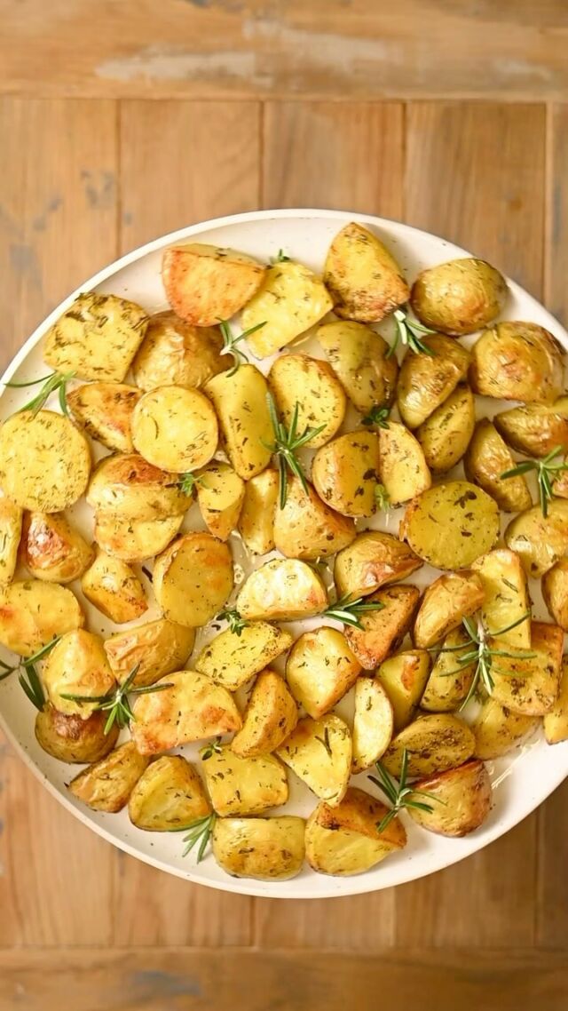 Beautifully golden brown with crispy edges and perfectly seasoned, these Roasted Honey Gold Potatoes make the most delicious side dish!
-24 ounces Honey Gold potatoes
-3 tablespoons olive oil
-3 sprigs fresh rosemary
-2 sprigs fresh thyme
-¼ teaspoon salt
-¼ teaspoon black pepper

-Preheat the oven to 425°F. -Chop your potatoes into 4 roughly equal-sized wedges and remove your rosemary and thyme from the stem and dice.  -Spread the potatoes out on a baking sheet and pour olive oil, rosemary, thyme, salt, and pepper on top.  -Use clean hands or a large spoon to toss to ensure each potato wedge is coated in oil and seasonings. -Roast for 30-35 minutes on the top rack, until potatoes are crispy and starting to turn golden brown.  -Top with more fresh rosemary and serve hot.