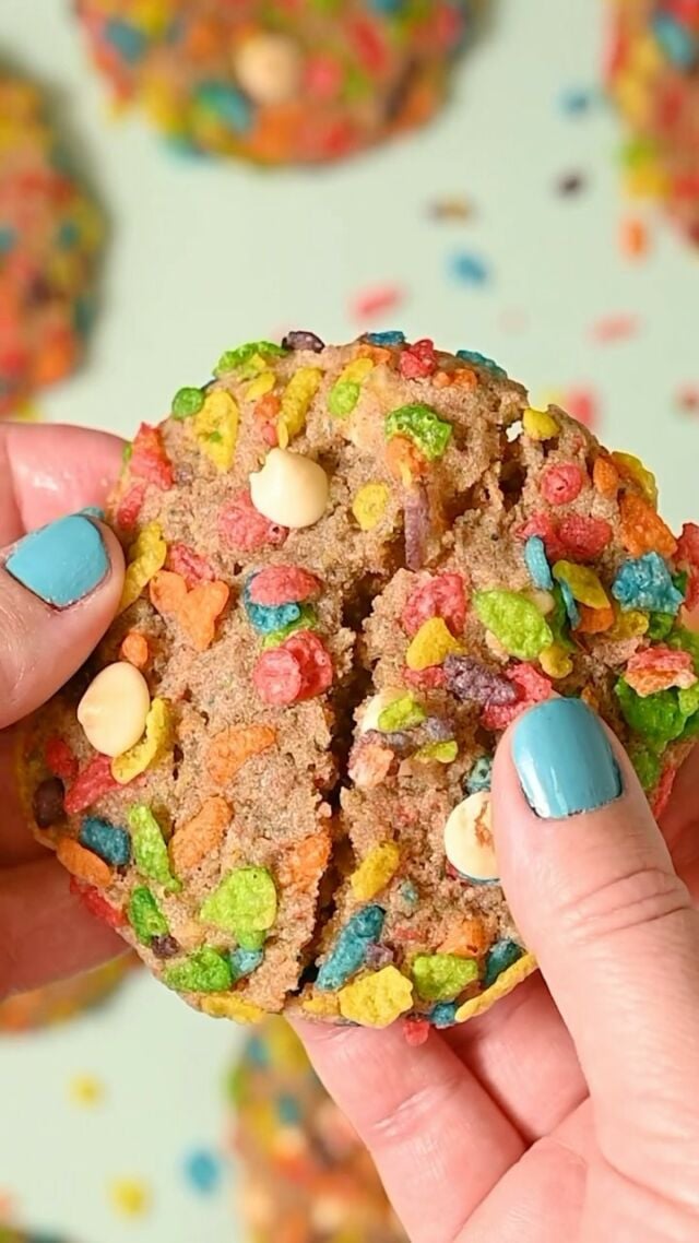 🌈 Happy Pride month! 🌈 These colorful cookies with white chocolate chips use Fruity Pebbles cereal both inside the dough and as a crispy outer layer to infuse fun flavor into each nostalgic bite.

-3 cups Fruity Pebbles (you will need ¾ cup of ground up cereal for the dough, the rest will coat the outside of the cookie)
-½ cup softened unsalted butter
-½ cup granulated sugar
-1 large egg
-1 teaspoon vanilla extract
-¾ cup all-purpose flour
-½ teaspoon baking powder
-½ teaspoon salt
-½ cup white chocolate chips

-Preheat the oven to 350°F and line a baking sheet with parchment paper or a reusable baking mat.
-Use a food processor or high-powered blender to grind up 1½ cups of the cereal into a fine dust. You will need ¾ cup of the ground cereal (make sure you measure after it’s ground up—use as much cereal as you need to get ¾ cup of cereal dust!). Add the remaining cereal to a shallow bowl and set all of the cereal aside.
-To a large mixing bowl, add the softened butter and sugar and use a hand mixer on high to cream together until smooth (this usually takes anywhere from 2-5 minutes).
-Add the vanilla extract and egg and mix again to combine.
Then, add the cereal dust, flour, baking powder, and salt and mix again until smooth.
-Use a spatula to fold in the white chocolate chips. Optional: keep a handful of white chocolate chips to the side to push into the top of the cookie dough before baking.
-Use a large cookie scoop or 2 heaping tablespoons of dough to form your cookies. One at a time, drop the cookie dough balls into the shallow bowl with the leftover Fruity Pebbles and gently press the cereal into the dough to create a crispy outer cereal coating.
-Add the cereal-coated cookie dough to the prepped baking sheets. Leave at least an inch of space in between each cookie for minor spreading. Optional: push the extra white chocolate chips into the top of the cookie dough.
-Bake for 14-16 minutes on the top rack. Allow them to cool and enjoy!