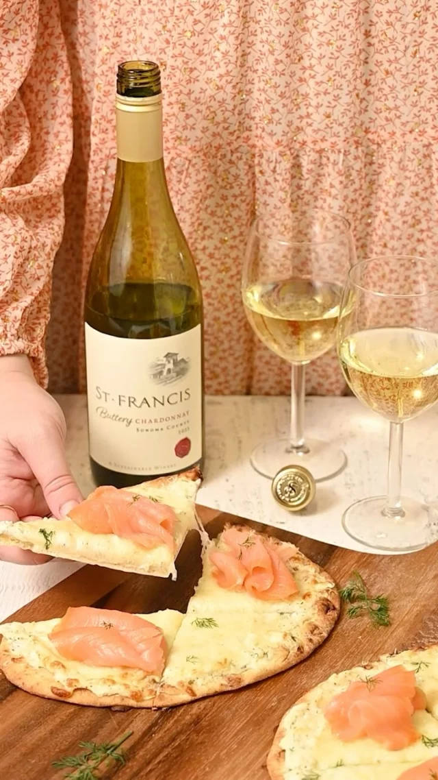 @stfranciswinery Buttery Chardonnay is one of my springtime favorites!  #stfrancispartner Pairing it with this 15-Minute Smoked Salmon Flatbread with melty mozzarella and garlic and dill ricotta makes for the perfect dinner. St Francis Winery is a Certified sustainable family-owned Winery and Estate Vineyards with green practices that include sustainable growing, solar energy installations and water recycling. They are even a pioneer in helping to define the vineyards and grape varieties Sonoma is known for today. Their fruit-forward, luscious and well-balanced wines are made from Sonoma’s finest fruit. Check the caption for the full recipe and grab St Francis Butter Chardonnay from a retailer near you. #stfranciswines

Smoked Salmon Flatbread (makes 2)
2 pieces naan bread
2 cloves garlic, minced
1 teaspoon chopped fresh dill + extra for garnish
½ cup full-fat ricotta
¼ teaspoon salt
¼ teaspoon black pepper
½ cup shredded mozzarella
½ cup shredded Parmesan
4 ounces smoked salmon

Method
-Preheat the oven to 425°F and place two naan breads on a large baking sheet.
-Stir together the ricotta, garlic, dill, salt, and pepper.
-Spread the ricotta mixture on the naan in an even layer.
-Top the ricotta with mozzarella and Parmesan cheese.
-Bake for 8-10 minutes until the cheese is nice and melted.
-Add the smoked salmon on top and finish with extra fresh dill. Slice and enjoy with a glass of @stfranciswinery Chardonnay.