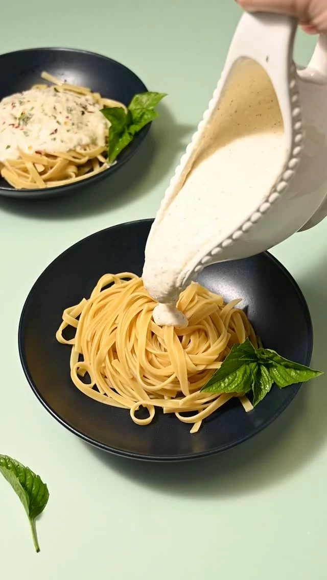 This 10-minute, no cook, 5-ingredient (plus salt and pepper) Creamy Ricotta Cheese Sauce is easy versatile and has the best velvety texture!

10-Minute Creamy Ricotta Cheese Sauce
-2 cloves garlic
-15 ounces ricotta cheese
-½ cup grated Parmesan cheese
-½ cup milk of choice
-½ teaspoon salt
-½ teaspoon black pepper
-¼ teaspoon crushed red pepper flakes (optional for heat)
-fresh basil for garnish (optional)

-Use the flat end of a sharp knife to crush the garlic cloves so that you can easily peel away the paper-thin outer layer.
-Add the peeled garlic cloves to a food processor or high-powered blender and blend on high until the garlic is minced.
-Add the ricotta, Parmesan, milk, salt, pepper, and red pepper flakes (optional) and blend on high until smooth.
-Serve over hot pasta, on crostini or toast, as a dip for veggies, or even with fresh fruit. If you are serving over pasta, I recommend conserving some of the water that the pasta is cooked in to loosen that sauce if need be.