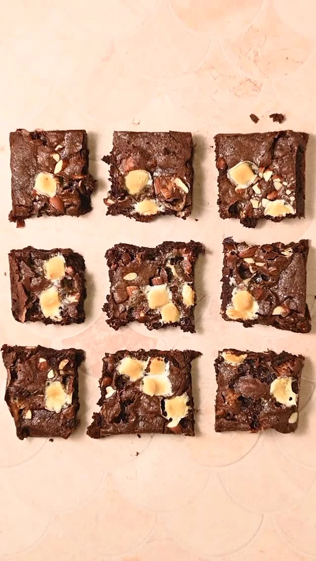 These Fudgy Rocky Road Brownies boast pools of gooey toasted marshmallow and crunchy bits of nutty almond for a chocolatey flavor explosion that can be made easily and in just one bowl.

-½ cup (1 stick) unsalted butter, softened 
-1 tablespoon neutral oil 
-1 ¼ cups granulated sugar
-2 large eggs
-2 teaspoons vanilla extract
-½ cup all-purpose flour
-½ cup unsweetened cocoa powder (I used dark)
-¼ teaspoon salt
-½ cup almonds, chopped
-¾ cup mini marshmallows

-Preheat the oven to 350°F and line your pan with parchment paper. Roughly chop your almonds.
-In a large mixing bowl, use a hand mixer on high to combine the softened butter, oil, and sugar for 2-3 minutes to cream together.
-Add the eggs and vanilla and use the hand mixer on low until combined.
-Mix in flour, cocoa powder, and salt and combine until smooth. Your batter should be light and airy.
-Use a spatula to fold in most of the almonds and marshmallows (keep a handful of each out). Transfer the brownie batter to your prepared pan and use a spatula to spread it out in an even layer. Sprinkle the rest of the nuts and marshmallows sporadically on top. Lightly press the marshmallows down into the batter so they are submerged (this will keep them from burning and make them nice and toasty instead).
-Bake for 25-30 minutes on the top rack of the oven, until the middle doesn't wobble when shaken. Allow to cool completely before removing from the pan and slicing into 9 or 16 brownies!

Comment "inbox" to get the recipe link sent directly to you https://marleysmenu.com/fudgy-rocky-road-brownies/