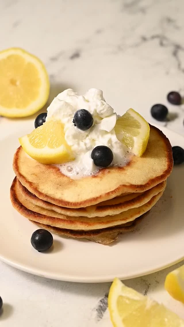 These Fluffy Lemon Pancakes are pillowy on the inside, crispy around the edges, and infused with zesty lemon flavor.

25-Minute Fluffy Lemon Pancakes

-2 tablespoons granulated sugar
-1 tablespoon lemon zest (zest of 1 lemon)
-1 cup milk
-2 tablespoons lemon juice 
-1 cup all-purpose flour
-2 teaspoons baking powder
-½ teaspoon salt
-1 large egg
-1 teaspoon vanilla extract
-3 tablespoons unsalted butter for frying 

-In a small bowl, add the granulated sugar and lemon zest. Use clean hands to massage the zest into the sugar, to extract the most lemon flavor from the zest and infuse it into the sugar.
-In a measuring cup or small bowl, add the lemon juice to the milk, stir, and set aside to slightly curdle to make acidified buttermilk.
-In a large mixing bowl, whisk together the flour, baking powder, lemon zest sugar, and salt.
-Add the egg, vanilla extract, and your buttermilk mixture, and whisk until smooth, careful not to overbeat. You want a bubbly mixture that is thin enough to run off your spoon, but not too thin that it spreads too flat on the pan. If the mixture seems too thin at this point, you can add up to 2 more tablespoons of flour to the batter.
-Add butter to your griddle or frying pan and allow it to heat up on medium-high until the butter is melted.
-For the fluffiest, most perfectly round pancakes, use pancake molds. Pour batter into your molds or freeform circles onto the pan and cook over medium heat.
When it's ready to flip, the batter on the uncooked side will start to form little air bubbles. Use a spatula to flip the pancakes and allow them to cook on the other side for 2-3 minutes.
-Continue to fry the pancakes, 2 or 3 at a time, until all of your batter is used up, adding butter when necessary. Serve warm with maple syrup!

Comment "inbox" to get recipe sent to your DM's https://marleysmenu.com/lemon-pancakes/